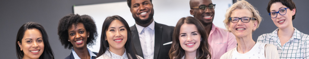 Diverse group of smiling professionals.